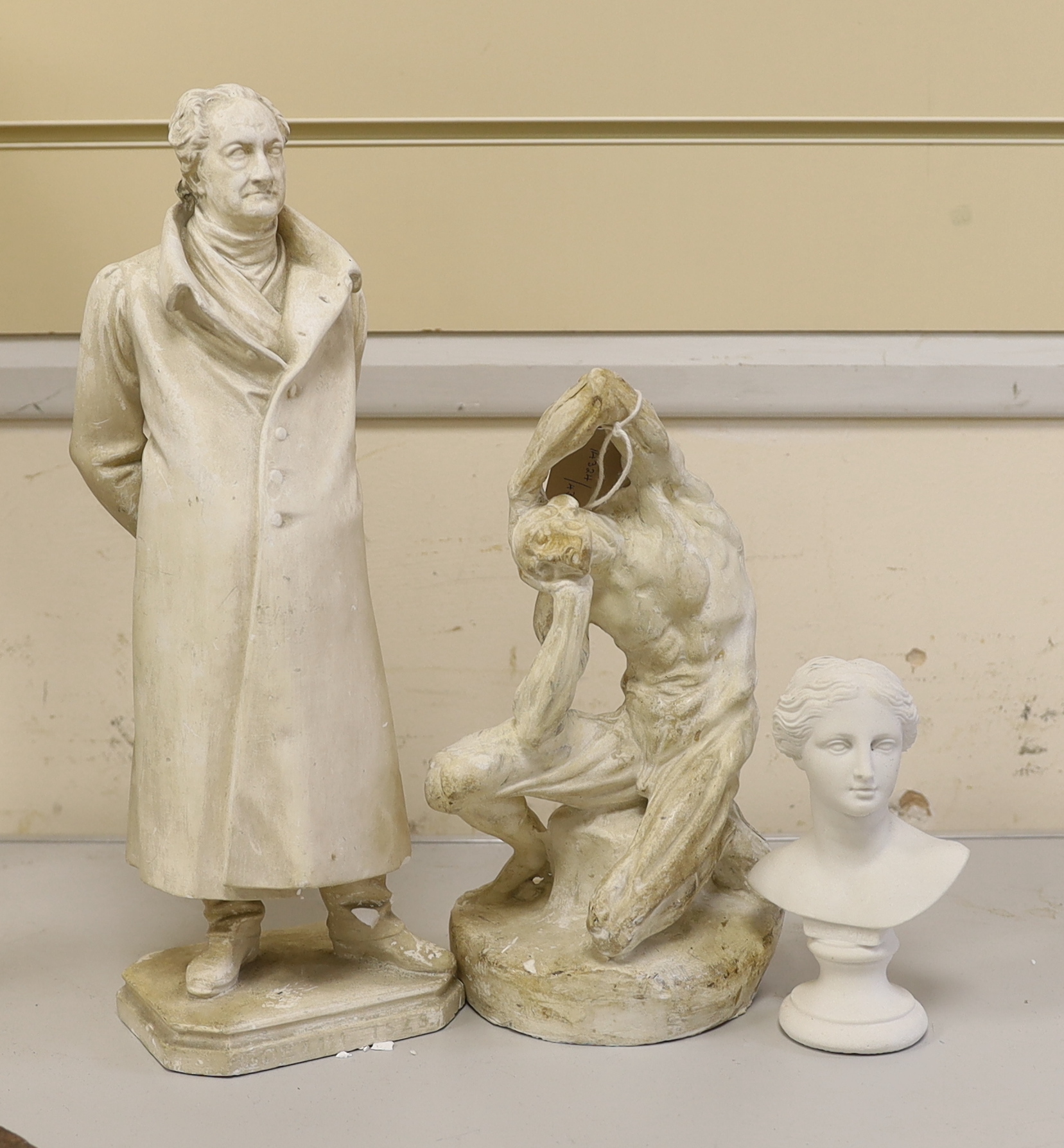 A plaster echore model, 20cm high, and three other items to include a bust of a lady